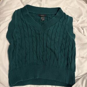 Dark green cable knit vest